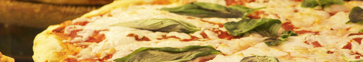 Eating Pizza at Hook & Ladder Pizza restaurant in Hollister, MO.